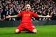 LONDON, ENGLAND - DECEMBER 29: Martin Skrtel of Liverpool celebrates after scoring the opening goal during the Barclays Premier League match between Chelsea and Liverpool at Stamford Bridge on December 29, 2013 in London, England. (Photo by Clive Rose/G
