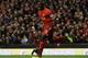 LIVERPOOL, ENGLAND - DECEMBER 07: Mamadou Sakho of Liverpool celebrates scoring his team's second goal during the Barclays Premier League match between Liverpool and West Ham United at Anfield on December 7, 2013 in Liverpool, England. (Photo by Clive B