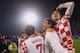 ZAGREB, CROATIA - NOVEMBER 19: Ivan Rakitic, Mario Mandzukic and Luka Modric (L-R) of Croatia celebrate after the FIFA 2014 World Cup Qualifier play-off second leg match between Croatia and Iceland at Maksimir Stadium on November 19, 2013 in Zagreb, Croa