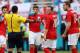 MIAMI GARDENS, FL - JUNE 07: Referee Ricardo Salazar (2nd L) speaks to Adam Lallana (L), Steven Gerrard (C), Wayne Rooney (2nd R) and Jordan Henderson (R) as Salazar delays the match due to inclement weather in the first half during the International Fri