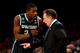 NEW YORK, NY - MARCH 28: Head coach Tom Izzo of the Michigan State Spartans talks with Branden Dawson #22 against the Virginia Cavaliers during the regional semifinal of the 2014 NCAA Men's Basketball Tournament at Madison Square Garden on March 28, 2014