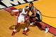 LeBron James has increasingly taken to directing the Heat's offense while playing in the low post.
