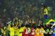 YOKOHAMA - JUNE 30: Cafu on the podium celebrates with the World Cup trophy after the World Cup Final match against Germany played at the International Stadium Yokohama, Yokohama, Japan on June 30, 2002. Brazil won the match 2-0. (Photo by Shaun Botteri