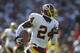 SAN FRANCISCO - SEPTEMBER 22: Cornerback Champ Bailey #24 of the Washington Redskins runs the ball against the San Francisco 49ers during the NFL game on September 22, 2002 at Candlestick Park in San Francisco, California. The 49er's won 20-10. (Photo
