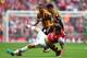 LONDON, ENGLAND - MAY 17: Olivier Giroud of Arsenal battles with Curtis Davies of Hull City during the FA Cup with Budweiser Final match between Arsenal and Hull City at Wembley Stadium on May 17, 2014 in London, England. (Photo by Shaun Botterill/Getty