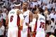 May 8, 2014; Miami, FL, USA; Miami Heat forward LeBron James (left) center Chris Bosh (center) and guard Mario Chalmers (right) chat during the second half in game two of the second round of the 2014 NBA Playoffs against the Brooklyn Nets at American Airl
