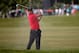 DORAL, FL - MARCH 09: Tiger Woods plays a bunker shot on the fifth hole during the final round of the World Golf Championships-Cadillac Championship at Trump National Doral on March 9, 2014 in Doral, Florida. (Photo by Chris Trotman/Getty Images)