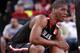 PORTLAND, OR - APRIL 12: Damien Inglis #8 of the World Team squats on the court during the game against Team USA on April 12, 2014 at the Moda Center Arena in Portland, Oregon. NOTE TO USER: User expressly acknowledges and agrees that, by downloading and