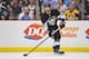 PITTSBURGH, PA - MAY 13: Kris Letang #58 of the Pittsburgh Penguins skates with the puck against the New York Rangers in Game Seven of the Second Round of the 2014 NHL Stanley Cup Playoffs on May 13, 2014 at CONSOL Energy Center in Pittsburgh, Pennsylvan