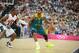 Patty Mills at the 2012 Olympics in London facing Chris Paul.