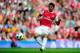 LONDON, ENGLAND - SEPTEMBER 11: Carlos Vela of Arsenal scores his teams fourth goal during the Barclays Premier League match between Arsenal and Bolton Wanderers at The Emirates Stadium on September 11, 2010 in London, England. (Photo by Jamie McDonald/
