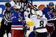 NEW YORK, NY - JUNE 11: Drew Doughty #8 of the Los Angeles Kings shoves Benoit Pouliot #67 of the New York Rangers during the second period of Game Four of the 2014 NHL Stanley Cup Final at Madison Square Garden on June 11, 2014 in New York, New York. (