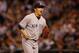SEATTLE, WA - JUNE 11: Starting pitcher Masahiro Tanaka #19 of the New York Yankees reacts as he comes off the field following a double play to end the eighth inning against the Seattle Mariners at Safeco Field on June 11, 2014 in Seattle, Washington. (
