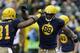 GREEN BAY, WI - OCTOBER 20: Jermichael Finley #88 of the Green Bay Packers celebrates with Andrew Quarless #81after scoring a touchdown in the first quarter against the Cleveland Browns during the game at Lambeau Field on October 20, 2013 in Green Bay, Wi