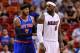 Apr 6, 2014; Miami, FL, USA; New York Knicks forward Carmelo Anthony (7) guards Miami Heat forward LeBron James (6) during the first half at American Airlines Arena. Mandatory Credit: Steve Mitchell-USA TODAY Sports