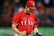 Jun 11, 2014; Arlington, TX, USA; Texas Rangers starting pitcher Yu Darvish (11) celebrates after a 6-0 complete game shut-out against the Miami Marlins at Globe Life Park in Arlington. Mandatory Credit: Jim Cowsert-USA TODAY Sports
