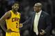 Apr 5, 2014; Cleveland, OH, USA; Cleveland Cavaliers head coach Mike Brown talks to guard Kyrie Irving (2) in the first quarter against the Charlotte Bobcats at Quicken Loans Arena. Mandatory Credit: David Richard-USA TODAY Sports