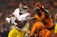 Nov 1, 2013; Corvallis, OR, USA; USC Trojans wide receiver Darreus Rogers (84) carries the ball under pressure from Oregon State Beavers cornerback Rashaad Reynolds (16) in the first half at Reser Stadium. Mandatory Credit: Jaime Valdez-USA TODAY Sports