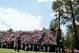 PINEHURST, NC - JUNE 12: A gallery of patrons watch Phil Mickelson of the United States hits his tee shot on the sixth hole during the first round of the 114th U.S. Open at Pinehurst Resort & Country Club, Course No. 2 on June 12, 2014 in Pinehurst, North