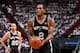 MIAMI, FL - JUNE 12: Kawhi Leonard #2 of the San Antonio Spurs shoots a foul shot against the Miami Heat during Game Four of the 2014 NBA Finals at American Airlines Arena in Miami, Florida on June 12, 2014. NOTE TO USER: User expressly acknowledges and