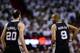 Jun 12, 2014; Miami, FL, USA; San Antonio Spurs guard Tony Parker (9) talks with guard Manu Ginobili (20) during the first quarter of game four of the 2014 NBA Finals against the Miami Heat at American Airlines Arena. Mandatory Credit: Bob Donnan-USA TODA