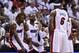 Jun 12, 2014; Miami, FL, USA; Miami Heat forward LeBron James (6) talks with center Chris Bosh (1), guard Dwyane Wade (3) during the second quarter of game four of the 2014 NBA Finals against the San Antonio Spurs at American Airlines Arena. Mandatory Cre