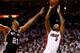 MIAMI, FL - JUNE 12: Rashard Lewis #9 of the Miami Heat takes a shot over Tim Duncan #21 of the San Antonio Spurs during Game Four of the 2014 NBA Finals at American Airlines Arena on June 12, 2014 in Miami, Florida. NOTE TO USER: User expressly acknowle