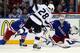 NEW YORK, NY - JUNE 11: Jarret Stoll #28 of the Los Angeles Kings shoots on Henrik Lundqvist #30 of the New York Rangers with John Moore #17 of the New York Rangers defending during the second period of Game Four of the 2014 NHL Stanley Cup Final at Madi