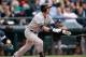 SEATTLE, WA - JUNE 12: Jacoby Ellsbury #22 of the New York Yankees hits a two-run home run in the first inning against the Seattle Mariners at Safeco Field on June 12, 2014 in Seattle, Washington. (Photo by Otto Greule Jr/Getty Images)