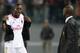 ROME, ITALY - APRIL 25: Mario Balotelli of AC Milan speaks with Clarence Seedorf during the Serie A match between AS Roma and AC Milan at Stadio Olimpico on April 25, 2014 in Rome, Italy. (Photo by Paolo Bruno/Getty Images)