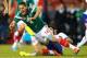 FOXBORO, MA - JUNE 06: Javier Hernandez #14 of Mexico is fouled by Neto #14 of Portugal in the second half during the international friendly match at Gillette Stadium on June 6, 2014 in Foxboro, Massachusetts. (Photo by Jared Wickerham/Getty Images)