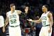 Oct 9, 2013; Providence, RI, USA; Boston Celtics guard Chris Babb (52) and point guard Phil Pressey (26) celebrate against the New York Knicks during the second half at Dunkin Donuts Center. Mandatory Credit: Mark L. Baer-USA TODAY Sports