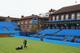 LONDON, ENGLAND - JUNE 05: The groundsman cuts the grass on centre court as the new layout turns from red to blue at Queens Club on June 5, 2009 in London, England. The newly named AEGON Championships will run from 8th June to 14th June 2009. (Photo by