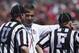 Apr 12, 2014; Columbus, OH, USA; Ohio State Buckeyes head coach Urban Meyer (M) talk with the officials during the Ohio State Buckeyes Spring Game at Ohio Stadium. Mandatory Credit: Greg Bartram-USA TODAY Sports