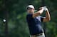 PINEHURST, NC - JUNE 13: Adam Scott of Australia watches his tee shot on the 18th hole during the second round of the 114th U.S. Open at Pinehurst Resort & Country Club, Course No. 2 on June 13, 2014 in Pinehurst, North Carolina. (Photo by Andrew Reding