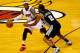 MIAMI, FL - JUNE 12: LeBron James #6 of the Miami Heat controls the ball as Kawhi Leonard #2 of the San Antonio Spurs defends during Game Four of the 2014 NBA Finals at American Airlines Arena on June 12, 2014 in Miami, Florida. NOTE TO USER: User expres