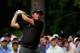 PINEHURST, NC - JUNE 12: Phil Mickelson of the United States watches his tee shot on the third hole during the first round of the 114th U.S. Open at Pinehurst Resort & Country Club, Course No. 2 on June 12, 2014 in Pinehurst, North Carolina. (Photo by M