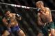 Jan 15, 2014; Duluth, GA, USA; TJ Dilleshaw (red gloves) fights Mike Easton (blue gloves) during UFC Fight Night at Gwinnett Center. Mandatory Credit: Joshua S. Kelly-USA TODAY Sports