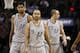 Jan 17, 2014; San Antonio, TX, USA; San Antonio Spurs players Tim Duncan (21) and Tony Parker (9) and Manu Ginobili (20) react during the second half against the Portland Trail Blazers at AT&T Center. The Blazers won 109-100. Mandatory Credit: Soobum Im-U