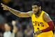 Apr 5, 2014; Cleveland, OH, USA; Cleveland Cavaliers guard Kyrie Irving (2) celebrates a three-point basket in the first quarter against the Charlotte Bobcats at Quicken Loans Arena. Mandatory Credit: David Richard-USA TODAY Sports