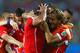CUIABA, BRAZIL - JUNE 13: Jean Beausejour of Chile (L) celebrates scoring his teams third goal with teammates during the 2014 FIFA World Cup Brazil Group B match between Chile and Australia at Arena Pantanal on June 13, 2014 in Cuiaba, Brazil. (Photo by