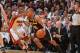 MIAMI, FL - JUNE 12: Patty Mills #8 of the San Antonio Spurs drives to the basket against the Miami Heat during Game Six of the 2014 NBA Finals on June 12, 2014 at American Airlines Arena in Miami, Florida. NOTE TO USER: User expressly acknowledges and ag