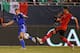 CHICAGO, IL - JUNE 03: Edin Dzeko #11 of Bosnia & Herzegovina passes under pressure from Hector Moreno #15 of Mexico during an international friendly match at Soldier Field on June 3, 2014 in Chicago, Illinois. Bosnia & Herzegovina defeated Mexico 1-0. (P