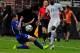 ST. LOUIS, MO - MAY 30: Muhamed Besic #7 of the Bosnia-Herzegovina slides to block a pass from Giovanni Sio #21 of the Ivory Coast during the first half of a friendly match at Edward Jones Dome on May 30, 2014 in St. Louis, Missouri. Bosnia-Herzegovina de