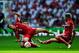 LONDON, ENGLAND - JUNE 04: Jack Wilshere of England (back) tangles with Stephan Lichtsteiner (L) and Valon Behrami of Switzerland during the UEFA EURO 2012 group G qualifying match between England and Switzerland at Wembley Stadium on June 4, 2011 in Lon