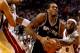 MIAMI, FL - JUNE 12: Kawhi Leonard #2 of the San Antonio Spurs drives to the basket as LeBron James #6 of the Miami Heat defends during Game Four of the 2014 NBA Finals at American Airlines Arena on June 12, 2014 in Miami, Florida. NOTE TO USER: User expr