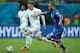 MANAUS, BRAZIL - JUNE 14: Daniele De Rossi of Italy fights off Wayne Rooney of England during the 2014 FIFA World Cup Brazil Group D match between England and Italy at Arena Amazonia on June 14, 2014 in Manaus, Brazil. (Photo by Richard Heathcote/Getty