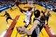 MIAMI, FL - JUNE 12: Dwyane Wade #3 of the Miami Heat goes to the basket against Manu Ginobili #20 of the San Antonio Spurs during Game Four of the 2014 NBA Finals at American Airlines Arena on June 12, 2014 in Miami, Florida. NOTE TO USER: User expressly
