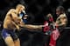 Jun 14, 2014; Vancouver, British Columbia, Canada; Yves Jabouin (red) fights against Mike Easton (blue) in their Bantamweight bout during UFC 174 at Rogers Arena. Mandatory Credit: Anne-Marie Sorvin-USA TODAY Sports