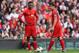 LIVERPOOL, ENGLAND - MARCH 30: Luis Suarez (R) and Daniel Sturridge of Liverpool prepare to kick off during the Barclays Premier League match between Liverpool and Tottenham Hotspur at Anfield on March 30, 2014 in Liverpool, England. (Photo by Alex Live